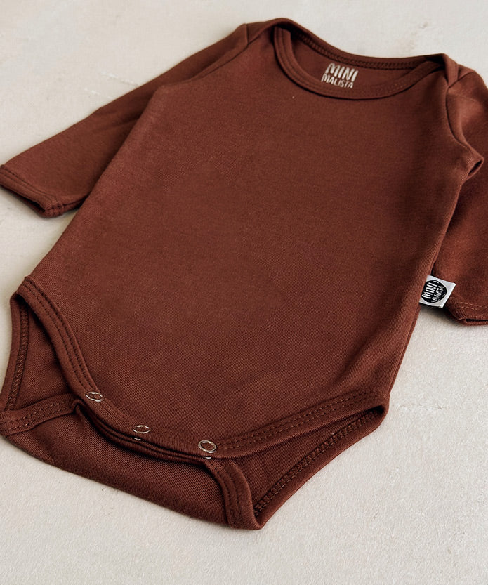 body-bebe-manga-longa-liso-oak-terracota-unissex-menino-menina-marrom_8425f240-6fea-4450-af6f-681b7f3aea84.jpg
